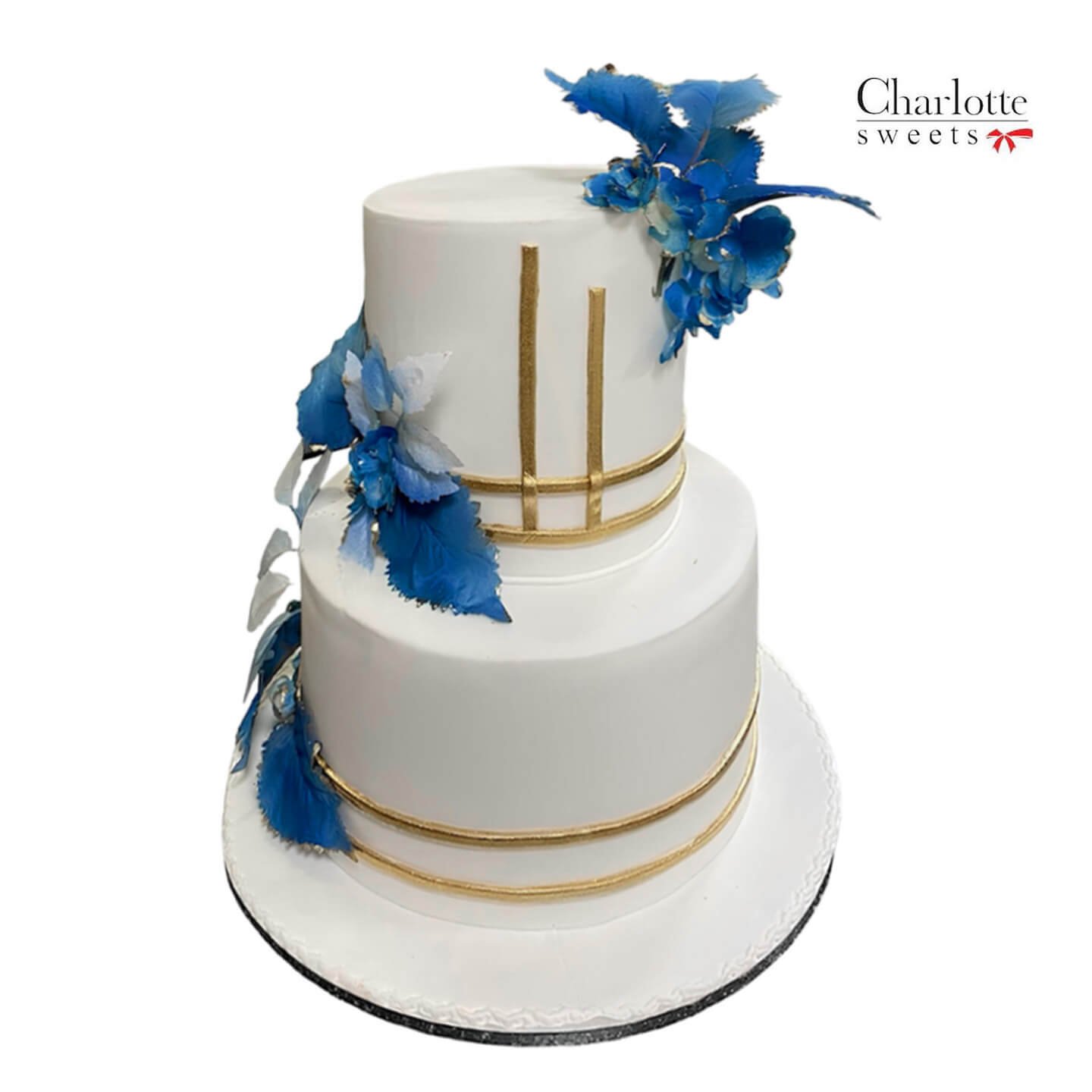 White Cake With Blue Flowers